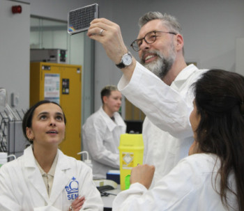 Representatives from Lush examining a CNBio organ-chip plate